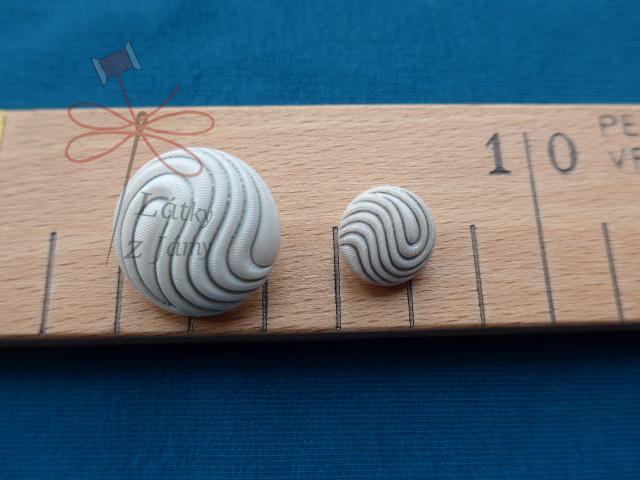 Knoflík světlý vlny