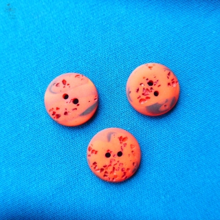 Knoflík světle červený se vzorem - 23mm